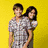 Animated sequence showing two people in a close embrace against yellow background, transitioning to outdoor setting with greenery and then intimate indoor moment.