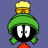 Pixelated cartoon character with green head, black face, white eyes, yellow top, and red bottom against solid purple background.