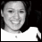 Black-and-white pixelated image split into two sections: left shows a person with dark hair and white clothing, right displays 'I' symbol, heart icon, and text 'KELLY!' on white background.