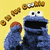 Blue puppet-like character with large eyes and open mouth, another blue figure with red hair, and floating brown cookies on yellow background.