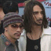 Six- of images with text overlays: two men in striped beanie and white jacket, large 'N' with 'Lose Yourself', two men in orange and plaid shirts, moon graphic with 'Escape Reality', two men in gray shirt and cap, sun graphic with 'Sublimation', red 'Boyskank.com' text