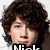 A four- shows a person with curly brown hair in different poses and expressions, including text overlays reading "Nick" and "HOT."