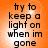 Orange background with black text reading 'try to keep a light on when im gone' in four identical arranged in a