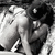 Black-and-white animated icon shows two figures in intimate pose with one figure's arm around the other's waist, both in light-colored clothing, on a textured background.