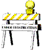Two identical construction barriers with yellow-and-white stripes, black legs, and a flashing light on top; text reads "UNDER CONSTRUCTION".