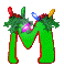 Green letter M with red outline, decorated with green foliage and colored lights; animation cycles through light colors on the left side.