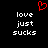 Red pixelated heart symbol above white text reading 'love just sucks' in two identical vertical on black background