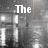 Black-and-white pixelated image with partial text fragments and a gray rectangular overlay.