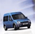 Blue van with dark windows and black tires on a light background, viewed from the front-left angle.