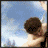 A pixelated animated sequence shows a shirtless figure with dark hair against a blue sky, transitioning from a side view to a close-up of the face with text appearing below.