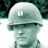 Static 48x48 pixel icon of a stylized human head with helmet, rendered in greenish-gray tones on white background.