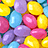 Pixelated image of colorful jelly beans on left, purple background with text "Today Christ Rose up to Heaven!" on right and bottom.