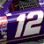 Animated sequence showing a purple and white race car with number 12, transitioning from close-up to full vehicle view against white background.