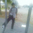 Pixelated outdoor scene with a person walking near trees and poles, next to green background with 'BEE YAW!!' text.