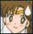 Pixelated close-up of a character with light brown hair, green eyes, and a neutral expression wearing a white garment.
