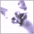 Pixelated abstract shapes in shades of purple and gray on a white background, with no discernible figures or text.