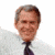 Four 50x50 pixel frames of an animated contact sheet showing a man in a white shirt and dark tie with varying facial expressions and poses against a transparent background.