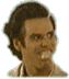 Two side-by-side pixelated images of a person with brown hair wearing a light-colored shirt, one smiling and the other grimacing.
