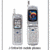 Two silver flip phones with antennas, one showing a colorful screen and the other displaying a gray interface.