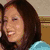 A person with long brown hair appears in three distinct poses: smiling left, smiling right with a blue 'gireen' text overlay, and smiling forward in a pink top.