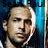 A 48x48 pixel buddy icon featuring a side-by-side contact sheet of two animated frames showing the same man's face with slight expression changes against a blue gradient background, labeled "Sean Paul" in white text above each frame.