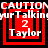 Red and black pixelated icon with "CAUTION" text, "yurTalkin" text, number "2", and "Taylor" text in four quadrants.