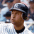Pixelated image of a person wearing a helmet and white shirt with dark collar, next to blue background with white text.