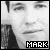 Static grayscale buddy icon featuring a pixelated face with visible text "MARK" in the bottom-right corner, rendered at 256x256 pixels.