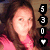 A pixelated image of a person with long brown hair wearing a pink top, with a vertical stack of four black-and-white pixelated symbols on the right side.