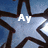 A star-shaped icon with a blue background and dark brown outline, displaying text that changes between frames.