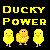 Pixelated yellow text 'DUCKY POWER' above three pixelated ducklings on a dark background.