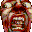 Pixelated figure with red-brown tones, light-colored eyes and mouth area, dark central section resembling a face or mask, surrounded by layered patterns in green, brown, and pink hues.