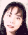A 40x50 pixel animated contact sheet showing two frames of a person with long dark hair against a light background, displaying subtle facial expression changes between frames.