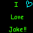 Green pixelated text 'I Love Joke!!' with a cyan heart symbol on black background, displayed in two identical side-by-side