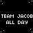 Black background with white pixelated text repeating 'TEAM JACOB' and 'ALL DAY', some instances include a colon or period after 'JACOB'.