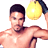 Static pixelated image of a shirtless man with dark hair holding a yellow spherical object above his head against a white background.