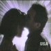 Static buddy icon showing two silhouetted figures kissing against a light purple background with radiating lines.