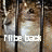 A pixelated image of a cat-like creature with brown and white fur, dark eyes, and a small red mark on its forehead, positioned behind vertical bars.