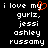 Black background with white pixelated text reading 'i love my gurlz, jessi ashley russamy' and a red heart symbol replacing the letter 'y' in 'my'.